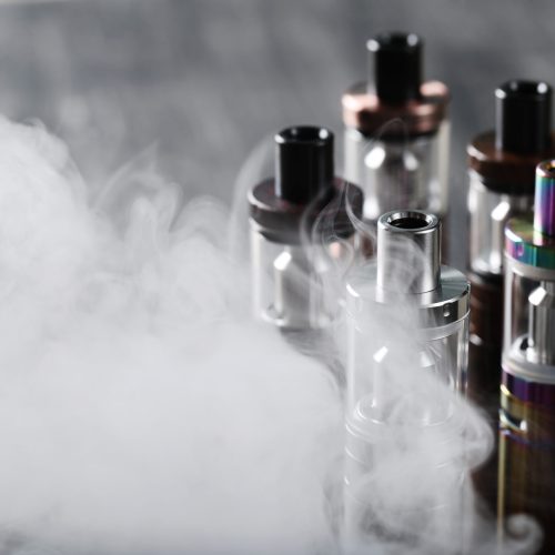 Vaping device on the wooden table