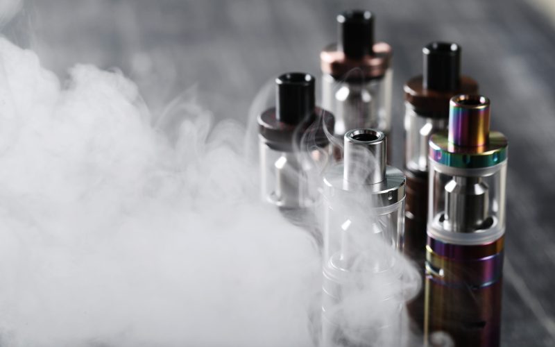 Vaping device on the wooden table